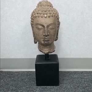 Large Buddha head on stand